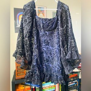 Current Mood brand It’s A Wild World mini dress (from Dolls Kill)